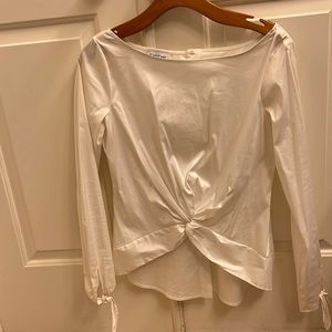 Bebe white suiting top hi/ low. NWOT